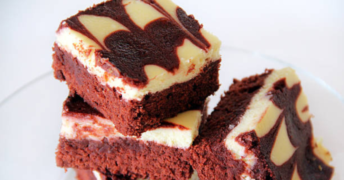 Decadent cheesecake brownies with a creamy cheesecake swirl over a rich chocolate brownie base